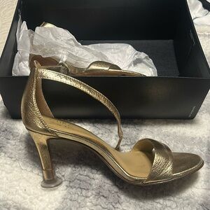 Gold high heels
